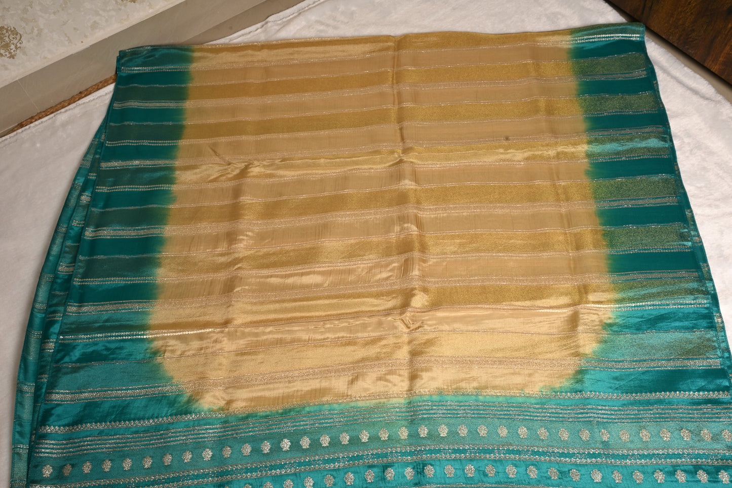 Tarangini Teal Blue Tissue Partywear Saree