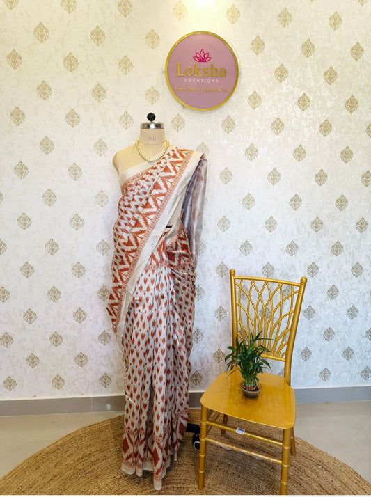 Kesari Ikkat Mulberry Silk Saree with Geometric Border
