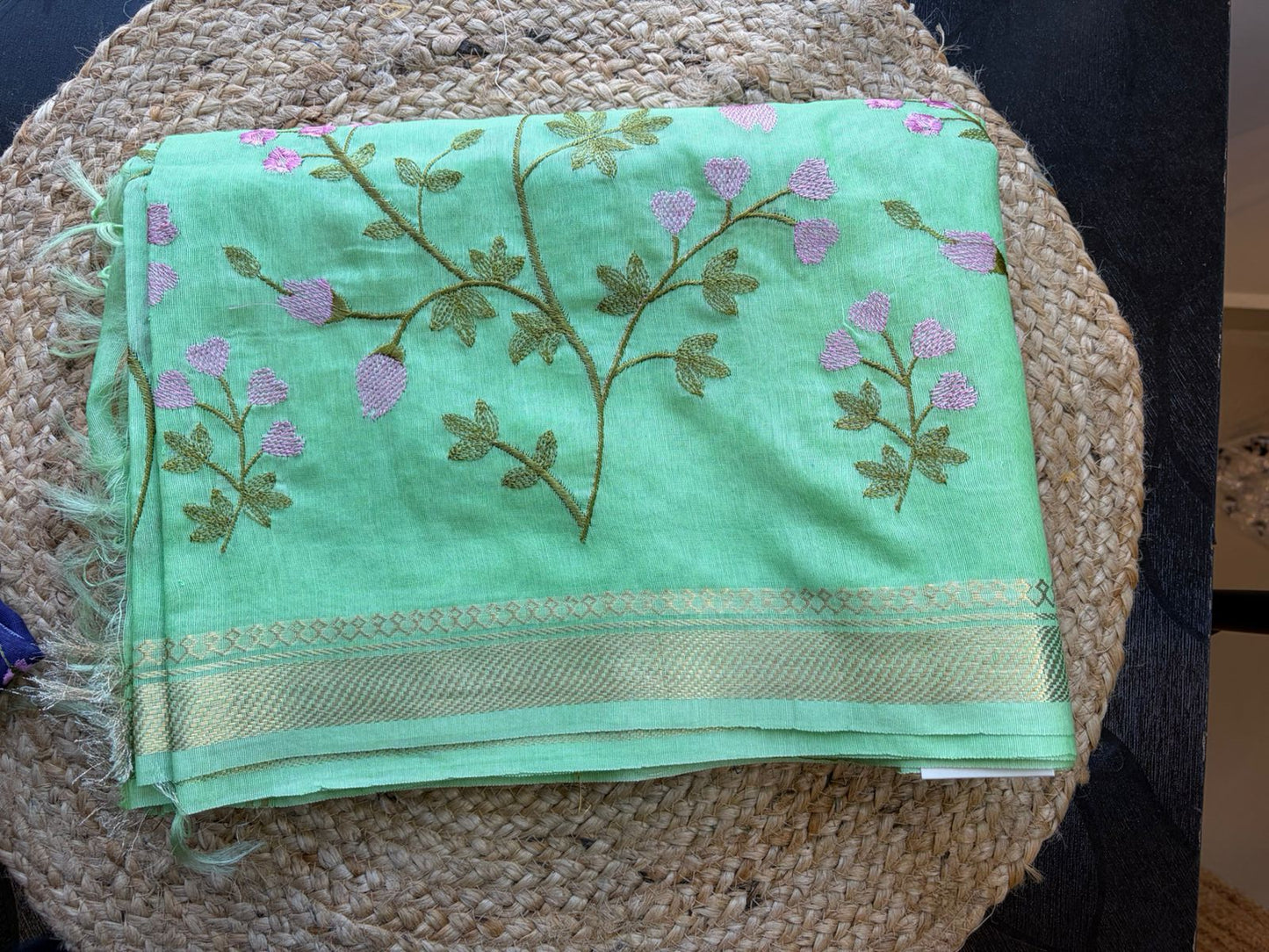 Mint Green Linen Saree with Floral Machine Embroidery & Zari Border